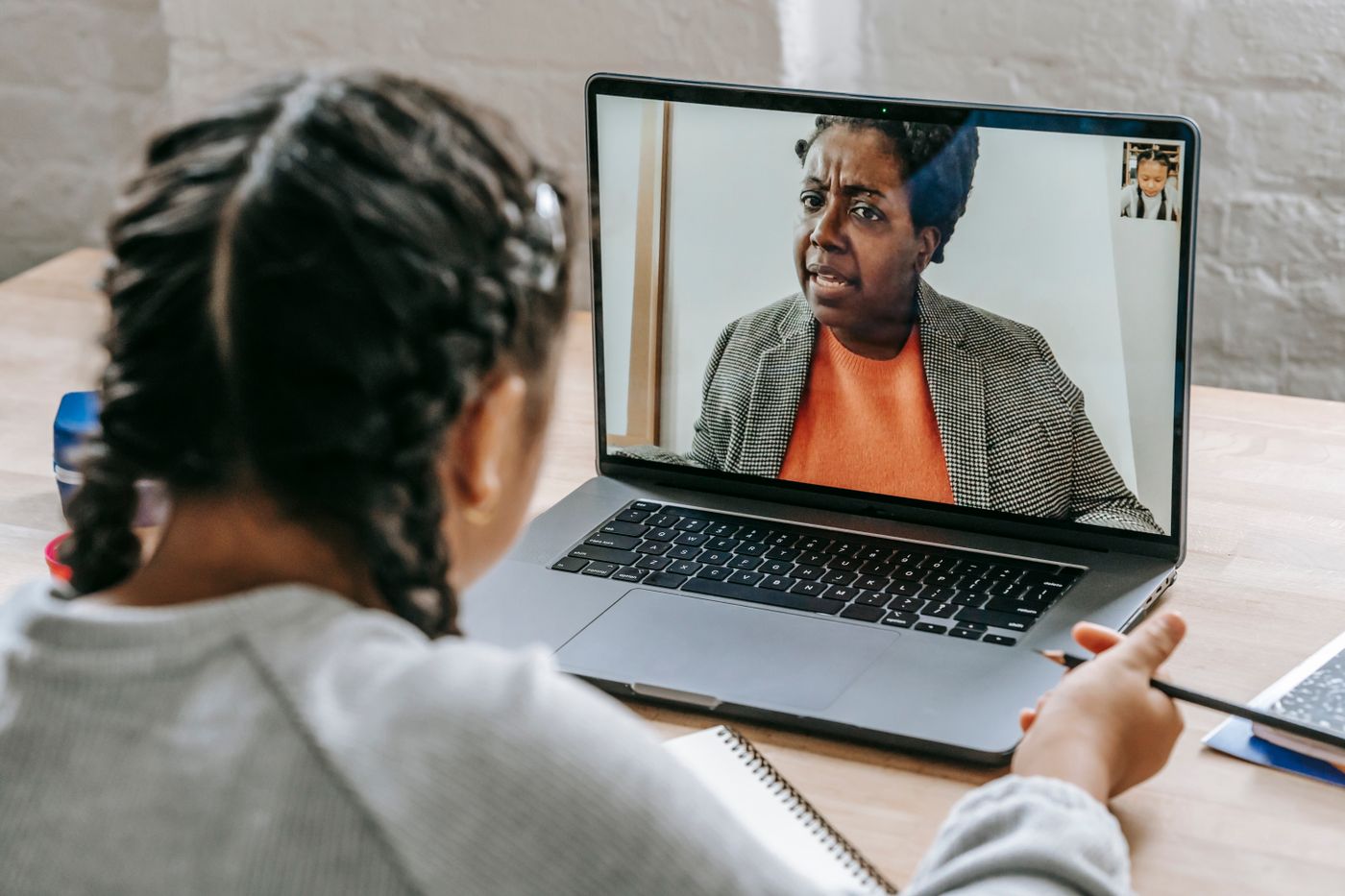 A student in a live one-to-one online lesson
